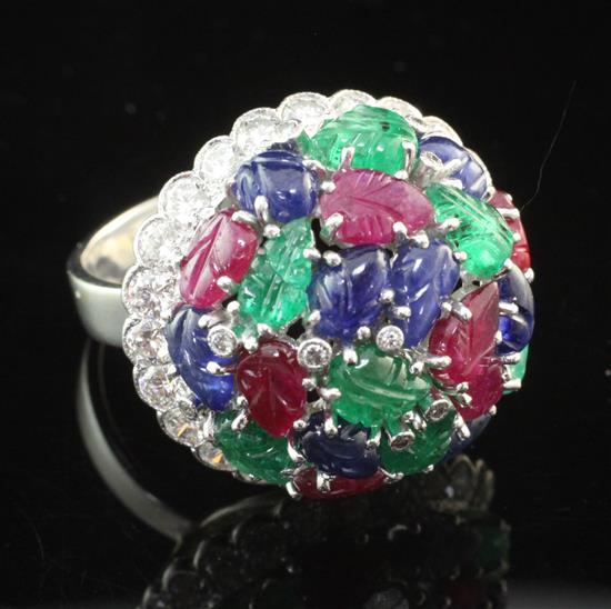 A modern 18ct white gold, diamond and multi gem set dress ring, size R.